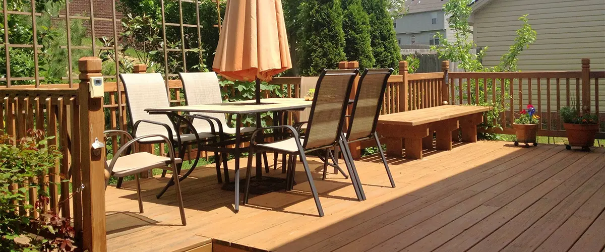 Outdoor deck with furniture and an umbrella