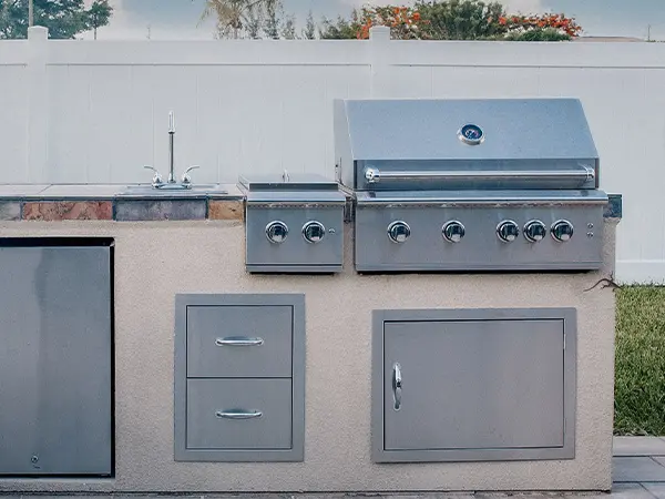 A grill in an outdoor kitchen