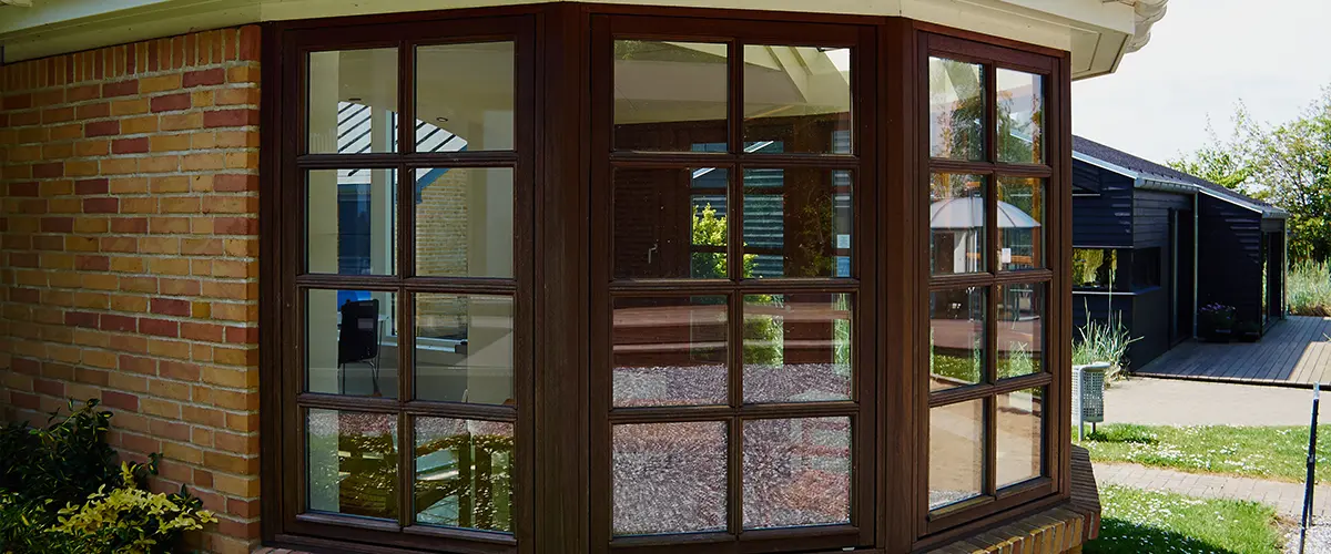 A beautiful sunroom with large windows