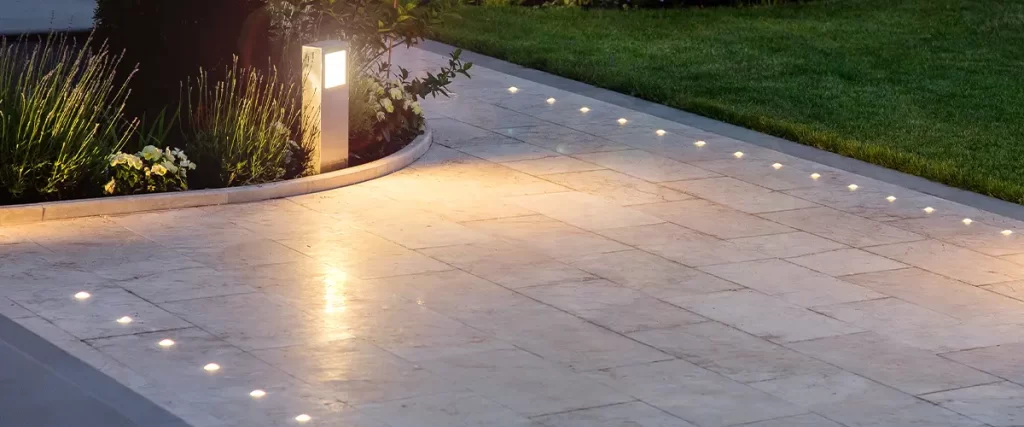 paver patio with lights in texas by MCM Construction