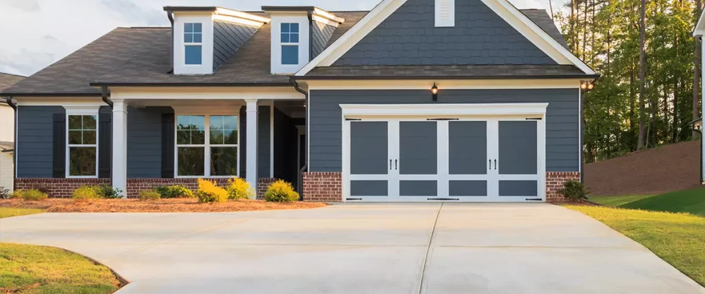 Exterior of the driveway and entrance to a large home