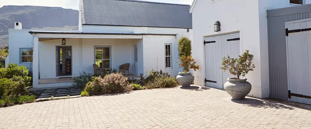 Exterior of the driveway and entrance to a large home