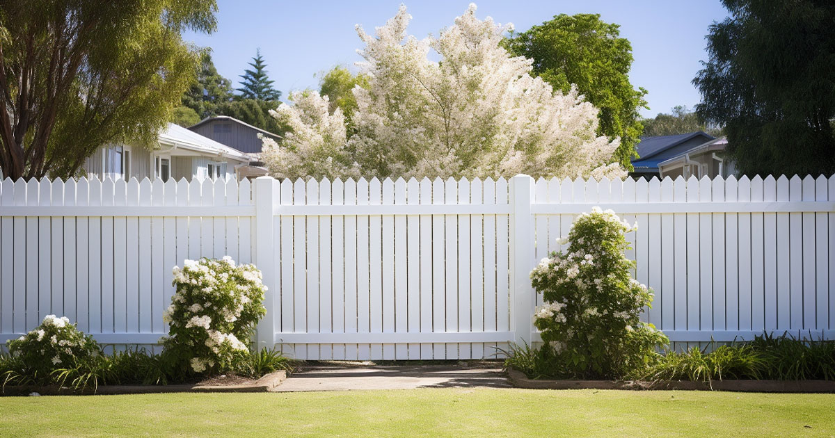 Types Of Fences, White wooden fence in the backyard and lawn