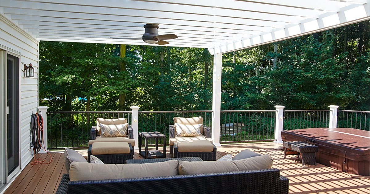 Sunny Outdoor Deck with Pergola and Hot Tub, Suburban Retreat View