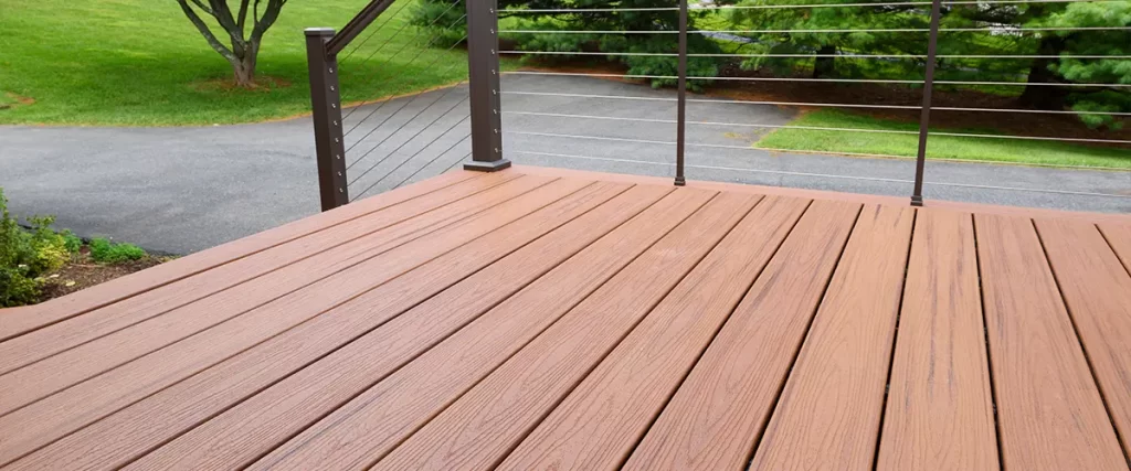 Brown Trex deck boards with cable railing system