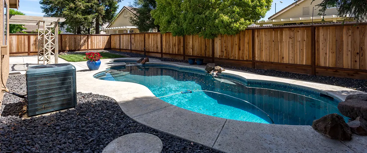 Custom inground pool with concrete surround