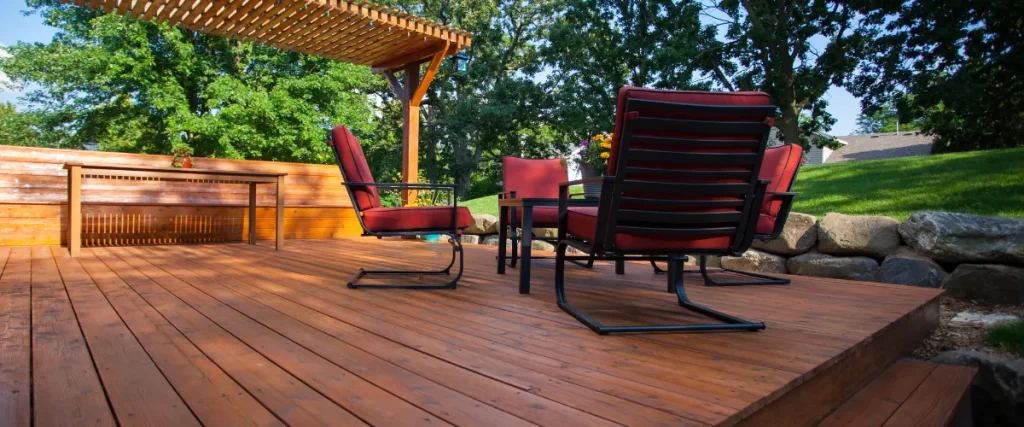 Backyard deck with fresh stain and outdoor seating