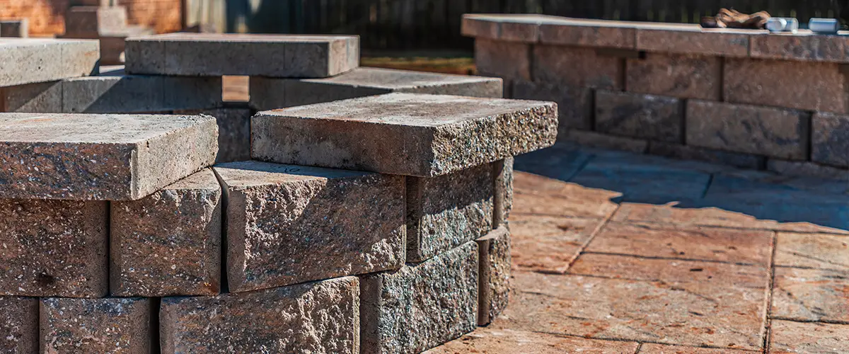 Stone fire pit with block seating area