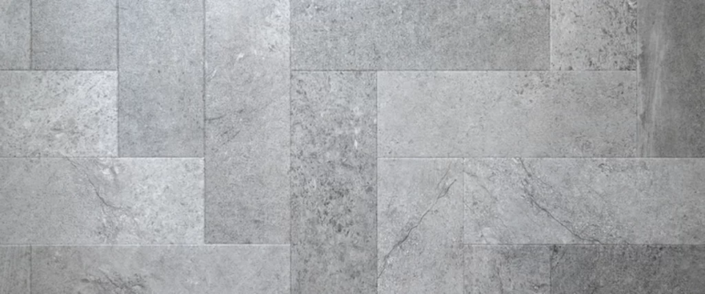 flooring texas outdoor kitchens fireplaces professional grade gray stone tiles arranged in a herringbone pattern