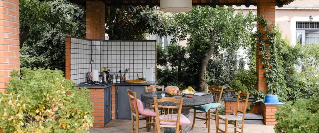 outdoor kitchens fireplaces kitchen layout outdoor kitchen with tiled backsplash brick pillars and rustic wooden furniture