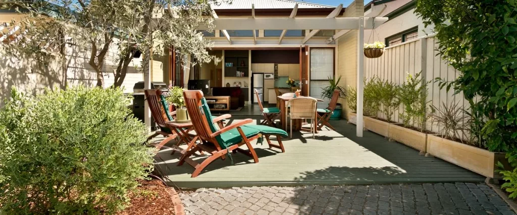 outdoor kitchens fireplaces kitchen layout professional outdoor kitchen with pergola teak furniture and lush greenery