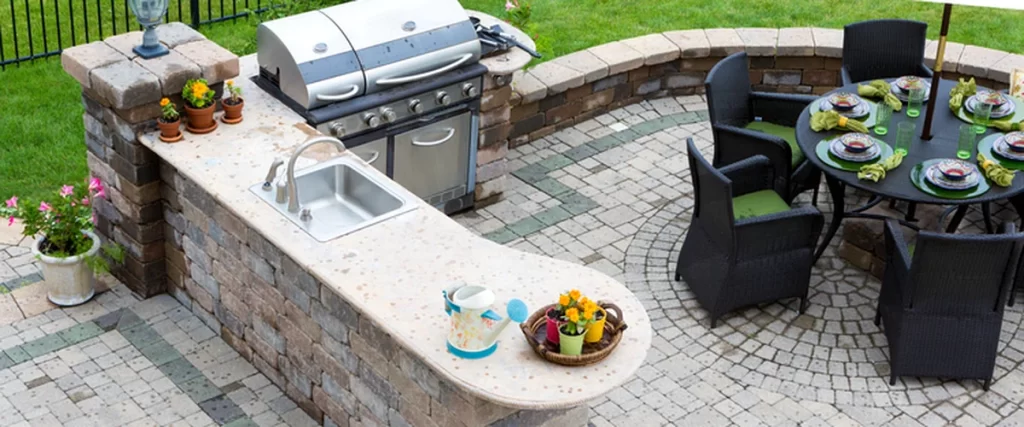 outdoor kitchens fireplaces outdoor kitchen with stainless steel grill stone countertops and dining area