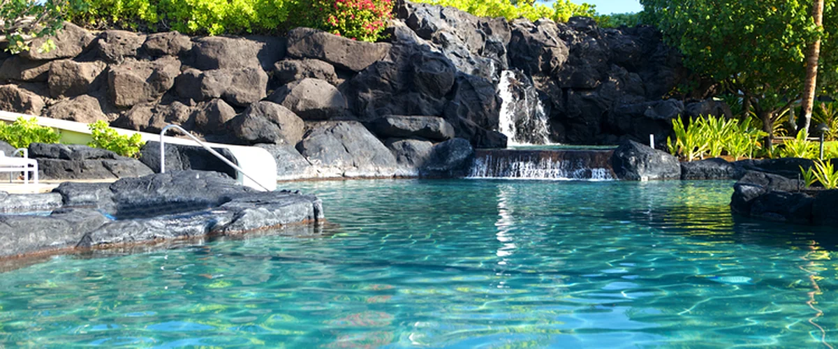pool builders allen tx pool spa installation tropical pool with waterfall surrounded by lush greenery and stone landscape