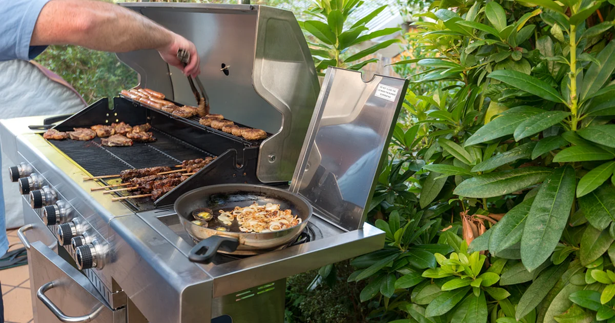 built in grills for outdoor kitchen a professional stainless steel built in grill with skewers and vegetables cooking