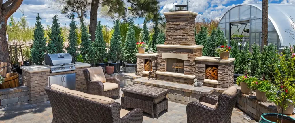 A custom masonry outdoor kitchen including a pizza oven, prep counters, and rustic brick detailing.