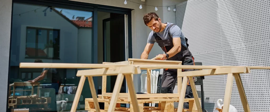 A cozy outdoor seating area with a fire pit located in a private backyard.