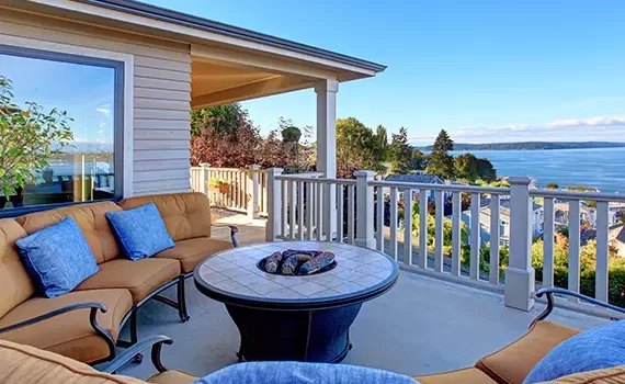deck-builder-texas Deck with cozy seating area and a fire pit table