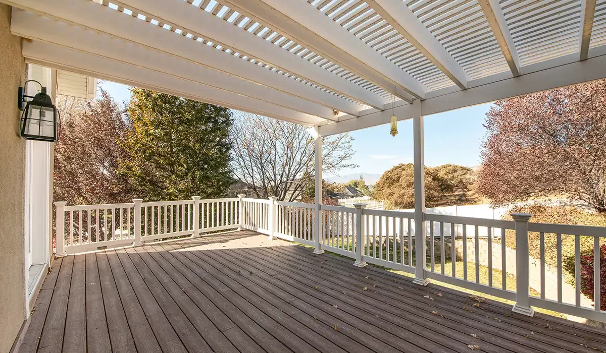 pergola-gallery-9 White pergola covering composite deck with railing and open view